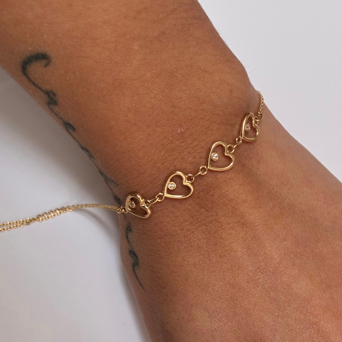 DOUBLE MINI ROLON BRACELET + 4 SMOOTH HEARTS AND WHITE STONE YELLOW GOLD ITALY ESP 18K 19CM - 2.91GR