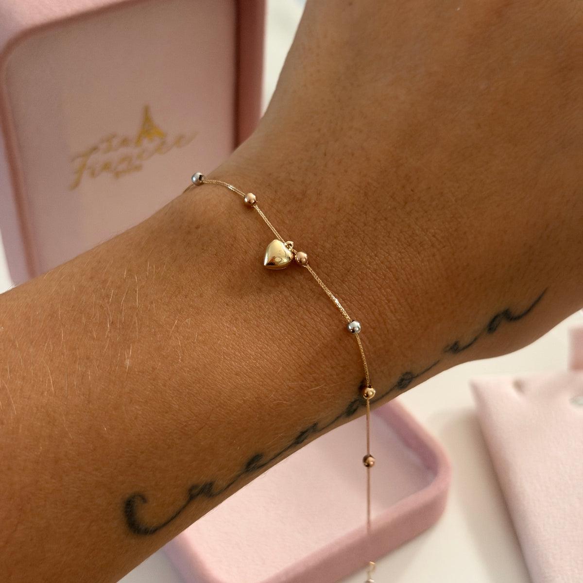 PULSERA MINI FRANCO 0.6MM + DIJE CORAZON Y BOLAS LISAS TRES OROS ITALY ESP 18K 17CM A 19CM - 0,64GR