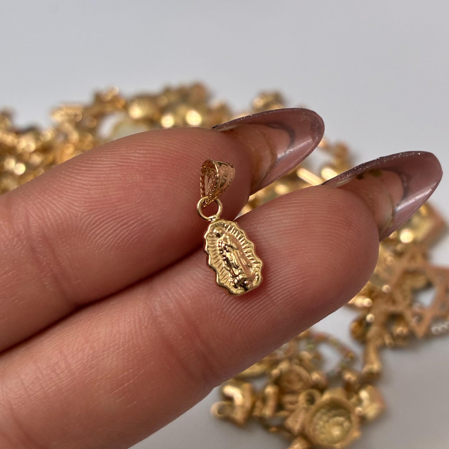 DIJE VIRGEN DE GUADALUPE EN SILUETA 1.2CM ORO AMARILLO COL 18K - 0,33GR