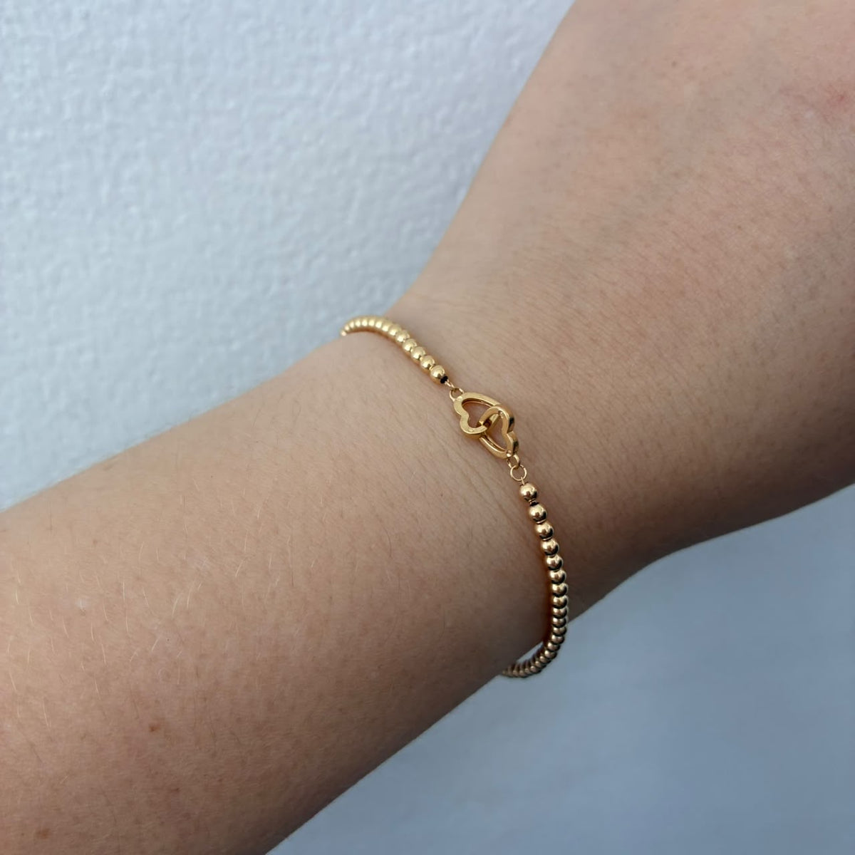 PULSERA MINI MILITAR+CORAZONES ABRAZADOS BOLAS LISAS ORO AMARILLO ITALY ESP 18K 16CM A 19CM - 1,54GR