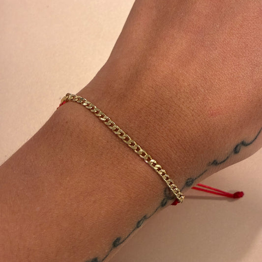 CUBAN STYLE RED THREAD BRACELET 18K YELLOW GOLD - 1.5GR