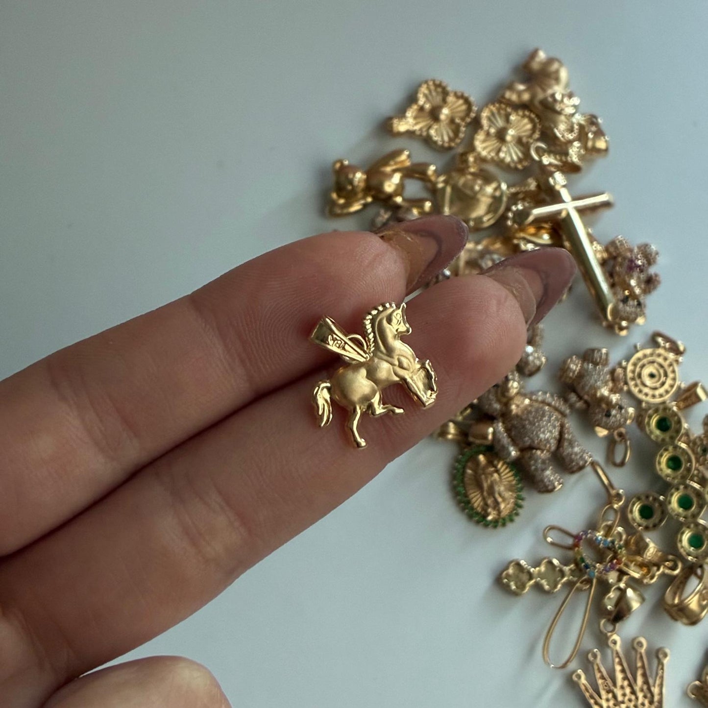 DIJE CABALLO LISO 1.5CM ORO AMARILLO COL 18K - 0,94GR