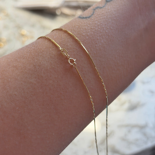 0.9MM SINGAPORE SNAKE CHAIN YELLOW GOLD ITALY 18K 50CM - 2.15GR