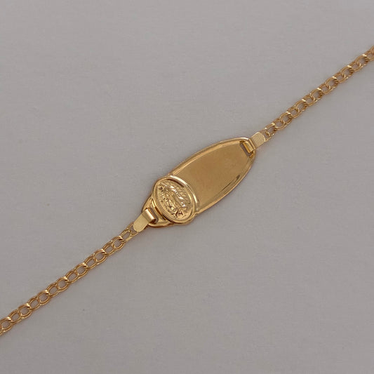 BABY BRACELET WITH OVAL PLAQUE WITH VIRGIN OF GUADALUPE, FOLLOWING RING, 18K YELLOW GOLD, 13CM - 1.3GR