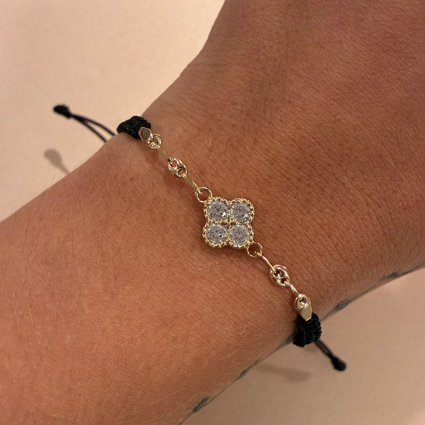 BLACK THREAD BRACELET WITH CLOVER CHARM, WHITE STONES + COFFEE BEAN, 18K YELLOW GOLD - 1.6GR