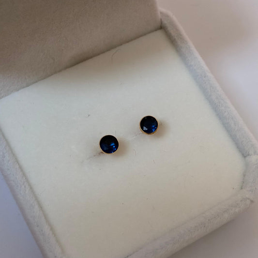 BLUE ZIRCON STUDS WITH 4MM BEZEL 18K YELLOW GOLD
