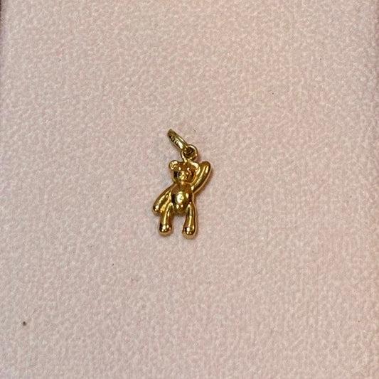 DIJE OSO MANO ALZADA 1,6CM ORO AMARILLO COL 18K - 0,58GR