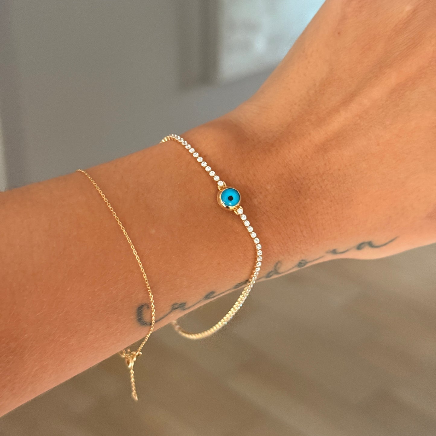 TENNIS BRACELET WITH WHITE ZIRCONS + TURKISH EYE IN YELLOW GOLD, ITALY ESP 18K, 19CM - 3.0GR