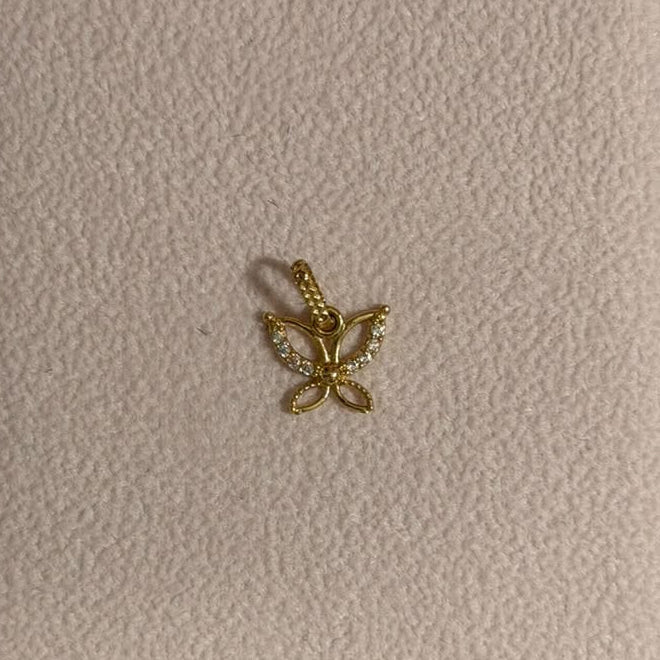 DIJE MARIPOSA SILUETA 1,1CM ORO AMARILLO COL 18K - 0,41GR