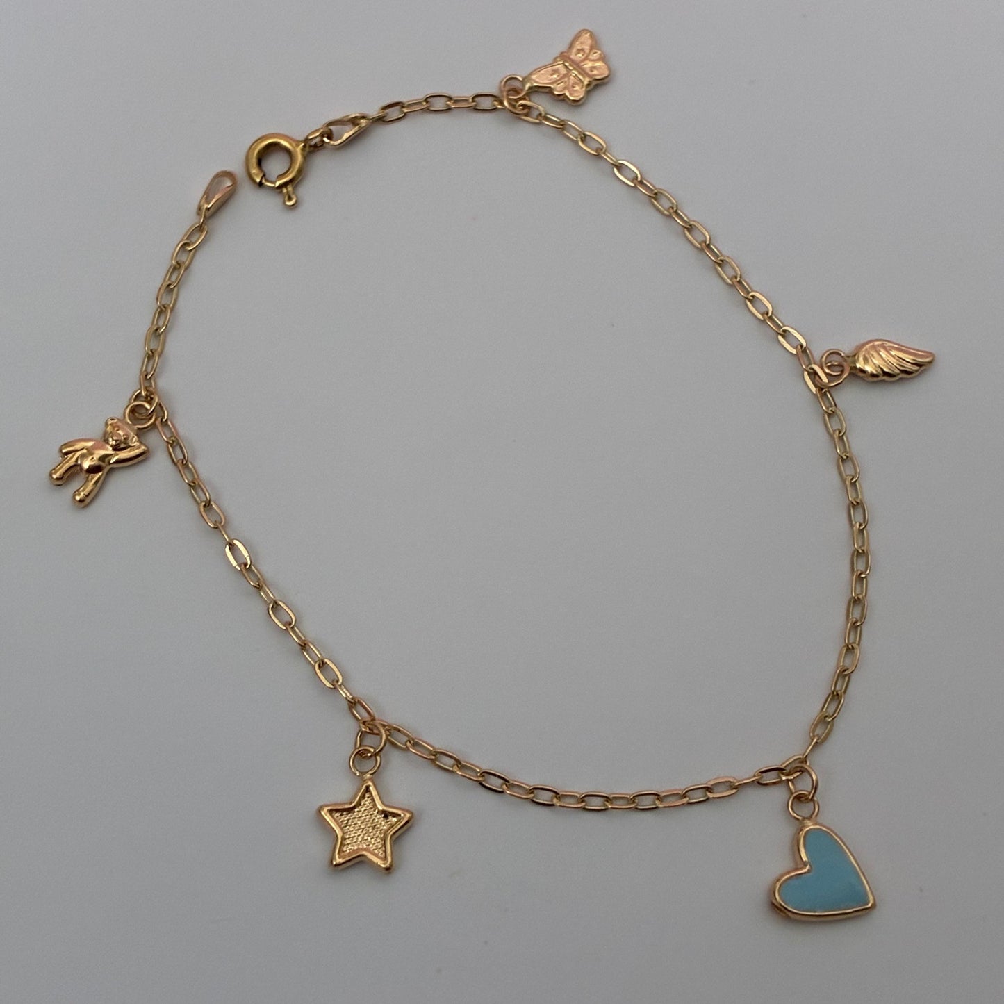 PULSERA DE LOS SUEÑOS CON DIJES OSO + MARIPOSA + ESTRELLA + CORAZON + ALA ORO AMARILLO COL 18K 19CM - 2,55GR
