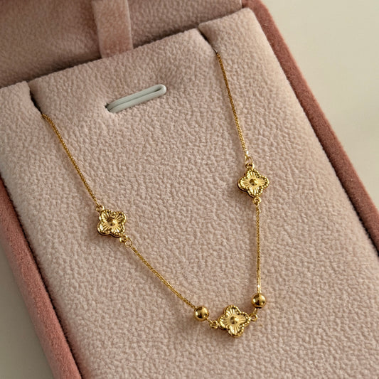PULSERA MINI FRANCO 0.6MM + TRES TREBOLES Y BOLAS LISAS ORO AMARILLO ITALY ESP 18K 17CM A 19CM - 0,77GR