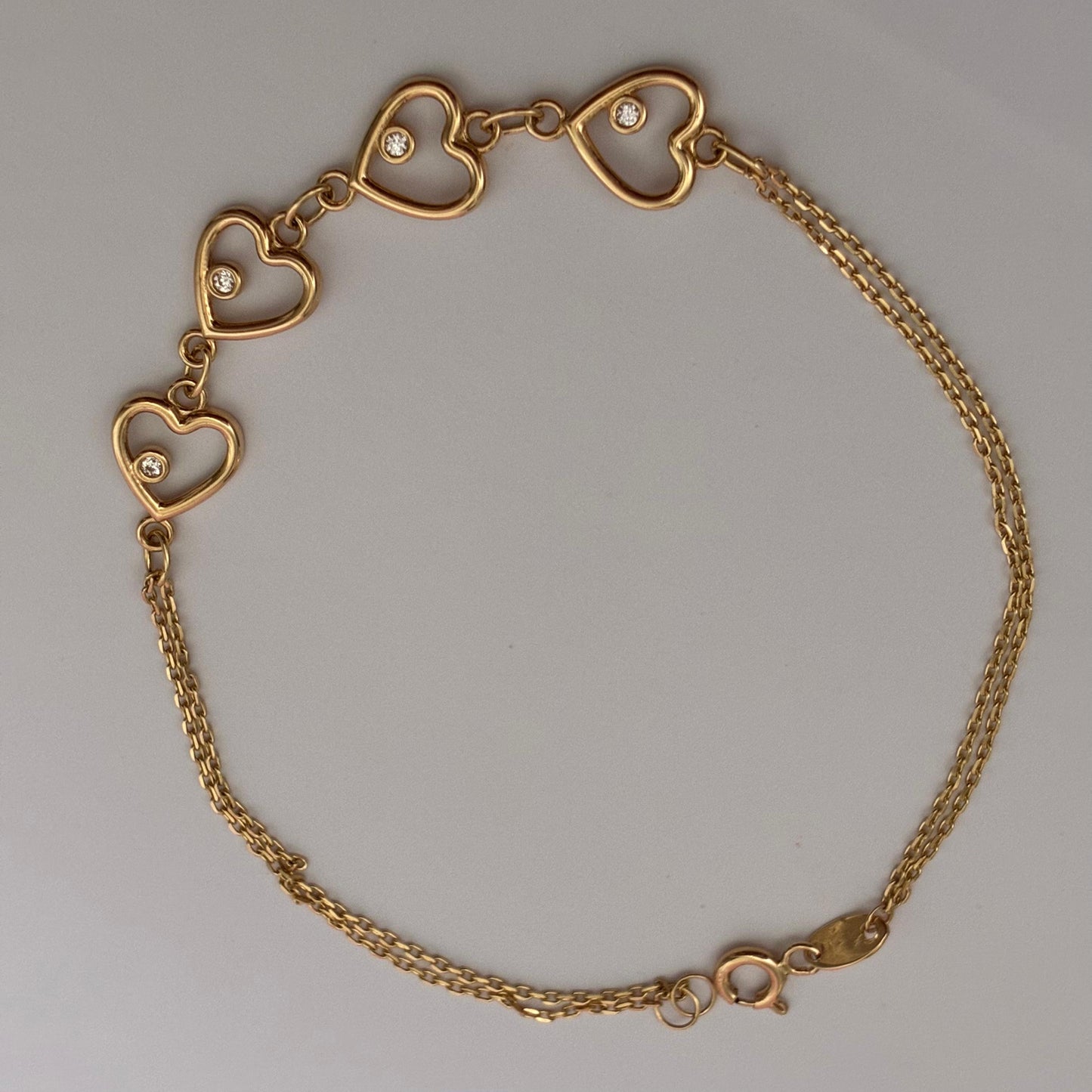 DOUBLE MINI ROLON BRACELET + 4 SMOOTH HEARTS AND WHITE STONE YELLOW GOLD ITALY ESP 18K 19CM - 2.91GR