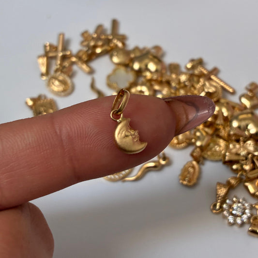 DIJE MEDIA LUNA CON ROSTRO 1,2CM ORO AMARILLO COL 18K. - 0,3GR