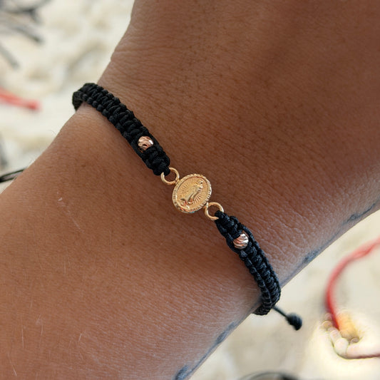 PULSERA HILO NEGRO HERRAJE VIRGEN DE GUADALUPE + 2 BOLAS DIAMANTADAS 3MM ORO AMARILLO Y ROSA 18K - 0,52GR