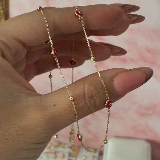 MINI ROLON STAR CHAIN ​​+ DIAMOND BEADS AND RED EYES YELLOW GOLD ITALY 18K 45CM - 2.41GR