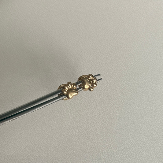 TOPOS HUELLAS DE PERRO ORO AMARILLO 18K - 0,65GR