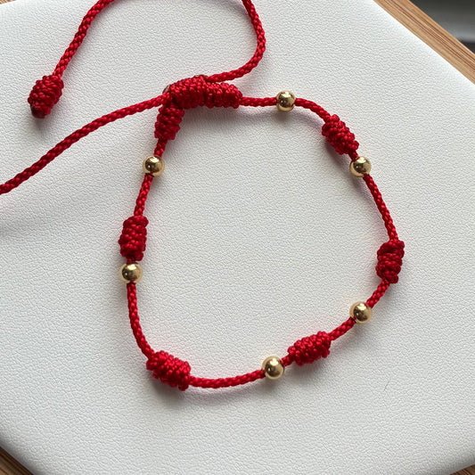 PULSERA HILO ROJO 7 NUDOS 6 BOLAS LISAS 4M ORO AMARILLO 18K - 0,54GR