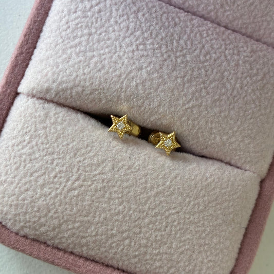 Star studs bordered with white stone, 18K yellow gold - 0.59g