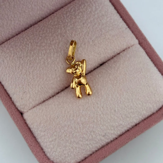 DIJE OSO MANO ALZADA 1.6CM ORO AMARILLO COL 18K - 0,48GR